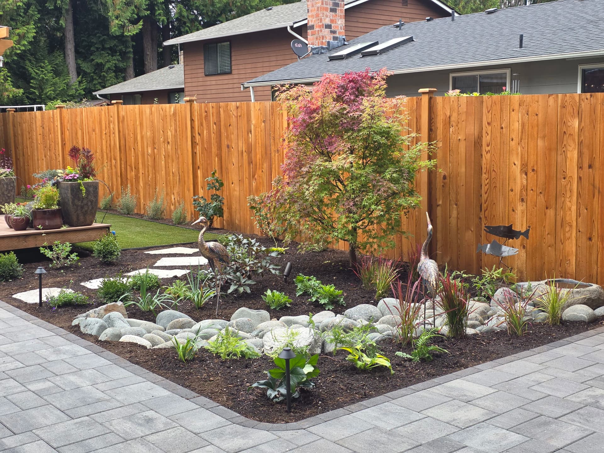 Gallery photos for Backyard Refresh With River Rock, Pavers, and Custom Plantings: Image #7